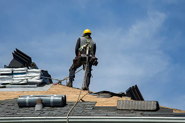 Professional Roof Replacement technician working in Elizabethport, NJ